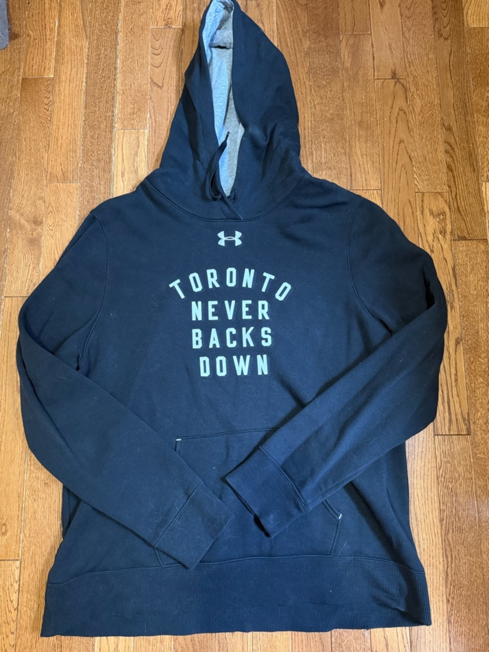 Under Armour Men's Navy Hoodie with Light Gray Interior and Text
